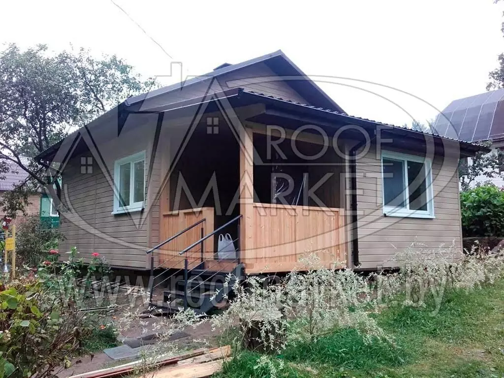 Реконструкция дома с использованием металлочерепицы МеталлПрофиль "Norman" Монтеррей