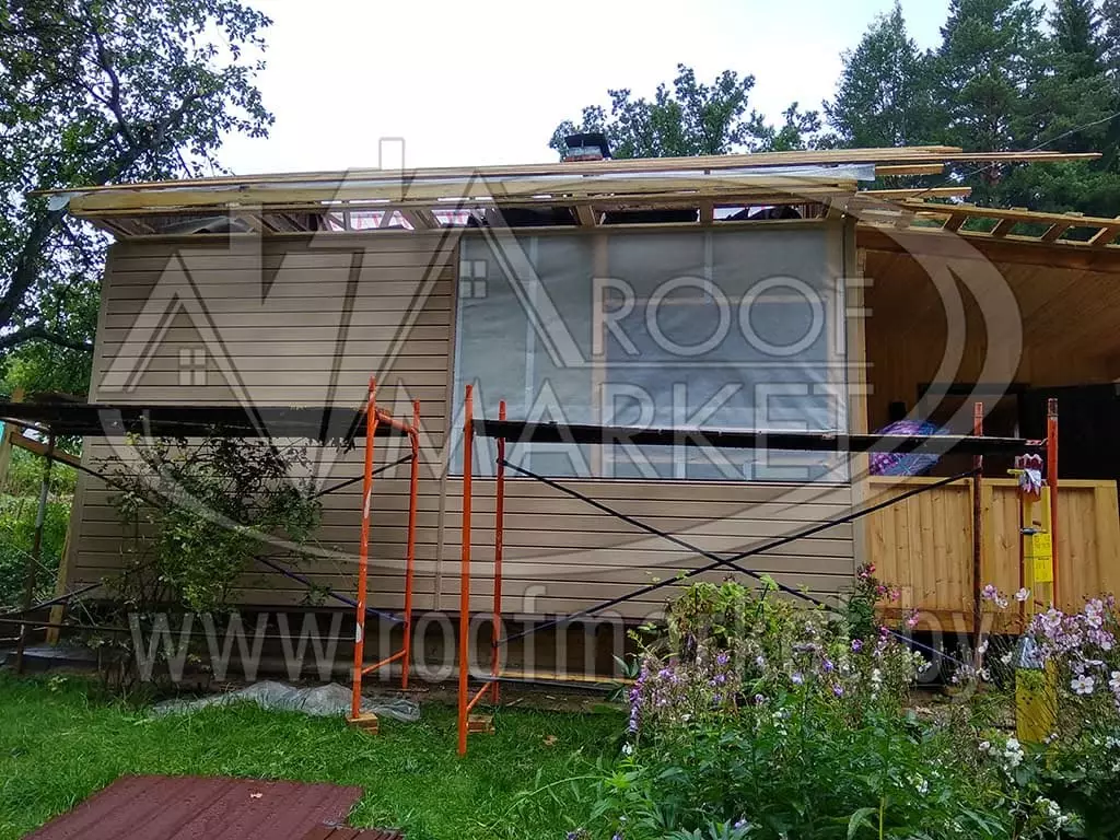 Реконструкция дома с использованием металлочерепицы МеталлПрофиль "Norman" Монтеррей